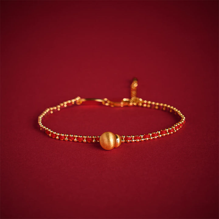 Buddha Stones de hilo rojo, cobre, latón y calabaza para la fuerza y ​​la riqueza - image 1