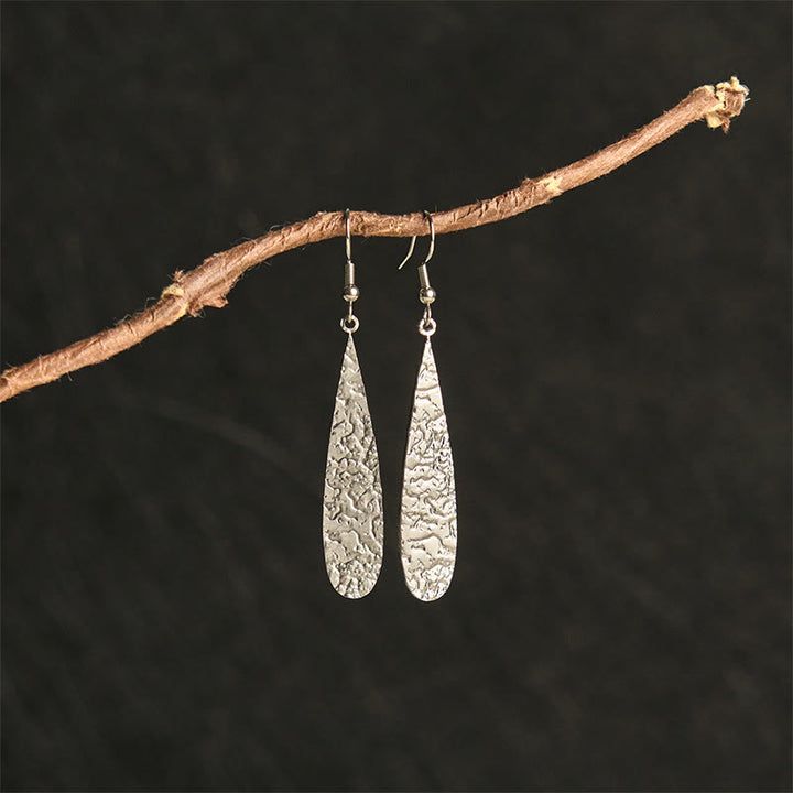 Pendientes elegantes de acero de titanio con marcas de martillo de equilibrio de Buddha Stones - image 3