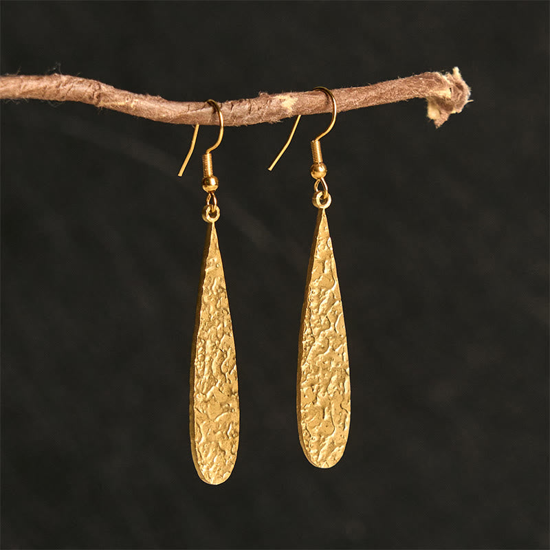 Pendientes elegantes de acero de titanio con marcas de martillo de equilibrio de Buddha Stones - Forma de lágrima dorada (postes de acero de titanio) - image 0