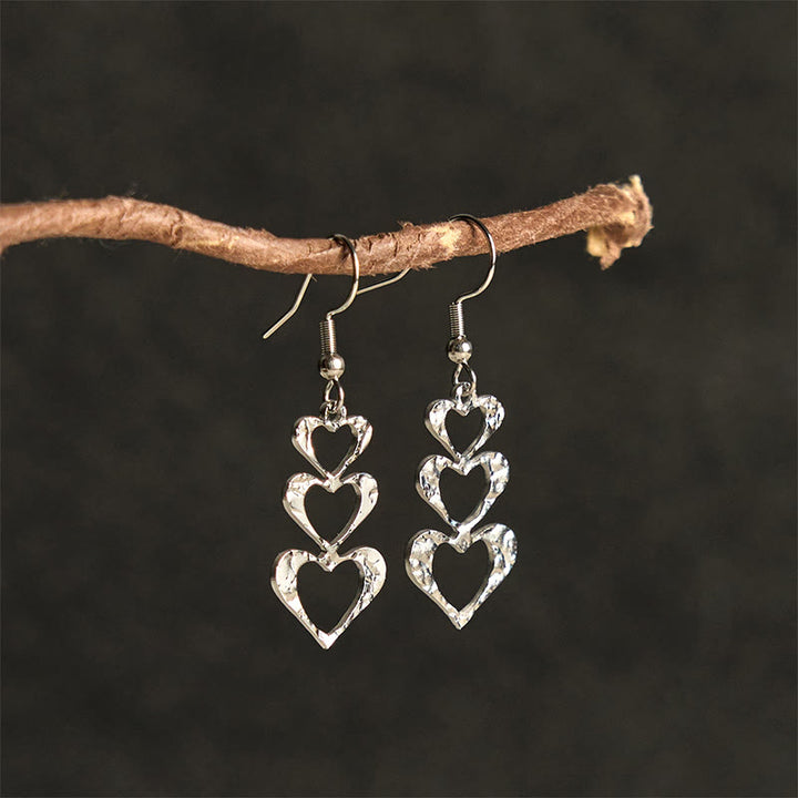 Pendientes elegantes de acero de titanio con marcas de martillo de equilibrio de Buddha Stones - image 14