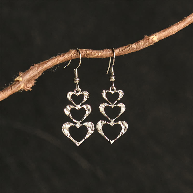 Pendientes elegantes de acero de titanio con marcas de martillo de equilibrio de Buddha Stones - Corazón plateado (postes de acero de titanio) - image 13
