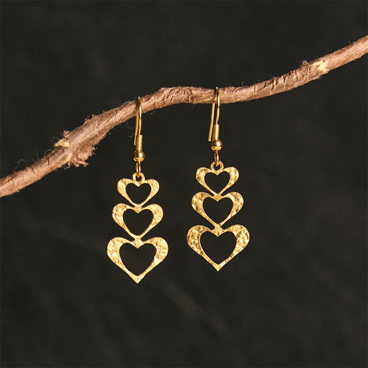 Pendientes elegantes de acero de titanio con marcas de martillo de equilibrio de Buddha Stones - Postes de acero de titanio con forma de corazón dorado - image 11
