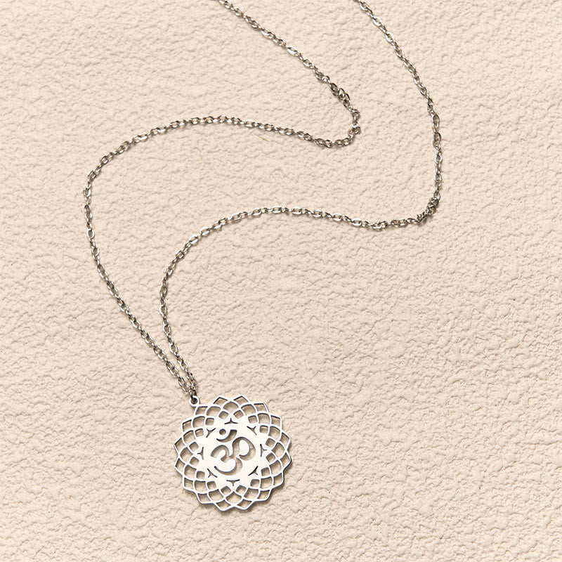 Collar con colgante de acero inoxidable con símbolo Om y diseño de loto hueco de Buddha Stones - image 12