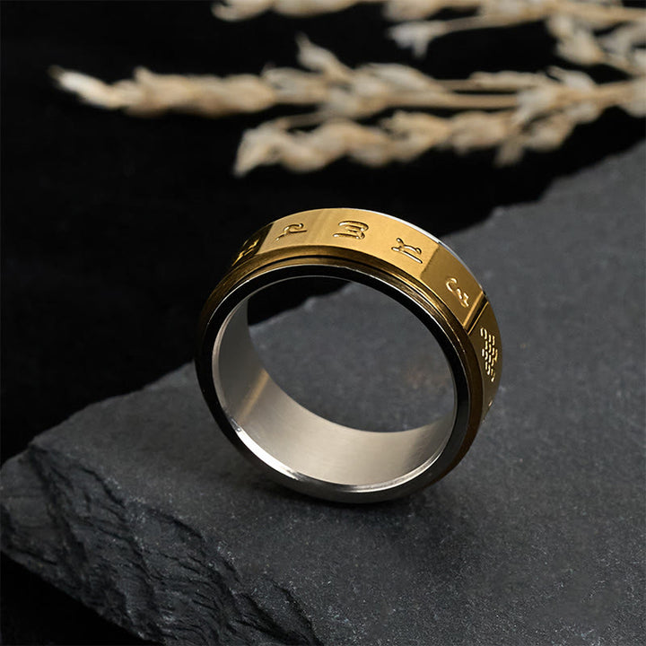 Anillo de la paz giratorio de acero y titanio con escrituras tibetanas Om Mani Padme Hum y Buddha Stones - image 1