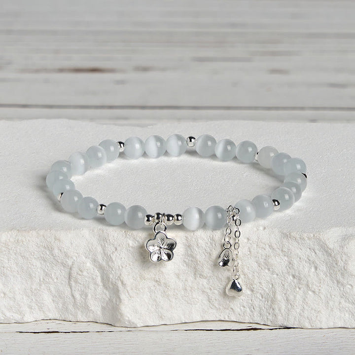 Pulsera de la paz con ojo de gato y flor de cerezo natural de Buddha Stones - image 2