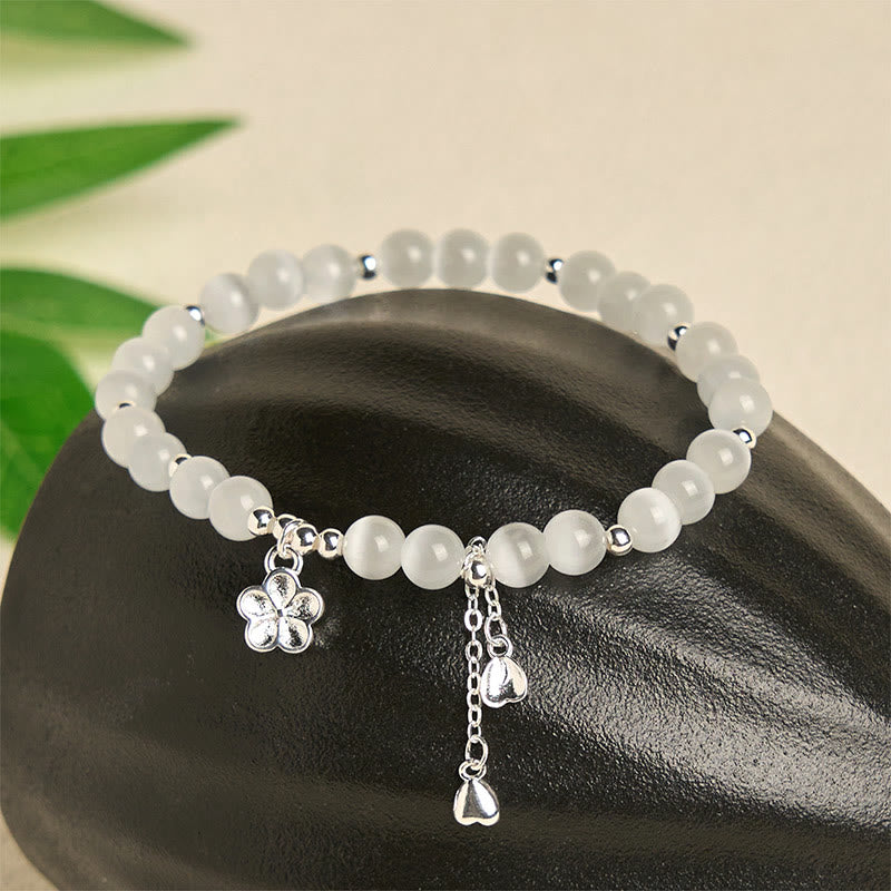 Pulsera de la paz con ojo de gato y flor de cerezo natural de Buddha Stones - image 1
