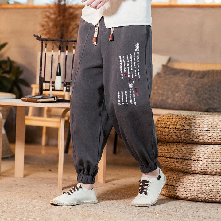 Pantalones de algodón para hombre con bolsillos y bordados de Buddha Stones y caracteres chinos - image 1