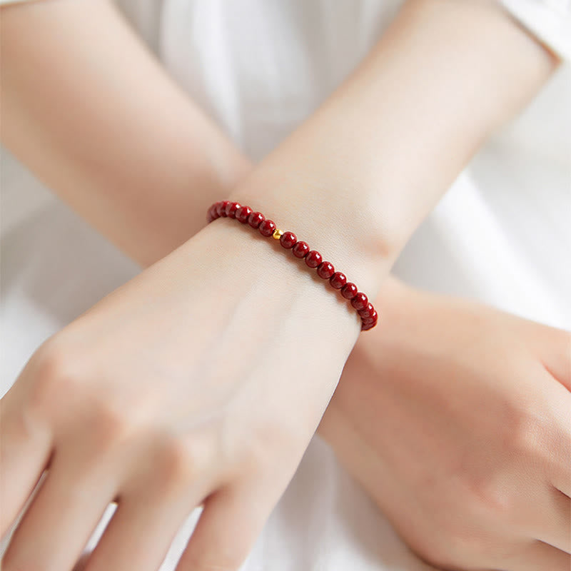 Pulsera de concentración con diseño simple de cinabrio y oro 999 de Buddha Stones - image 2