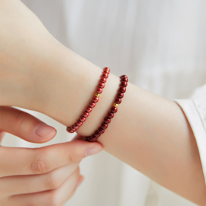 Pulsera de concentración con diseño simple de cinabrio y oro 999 de Buddha Stones - image 17