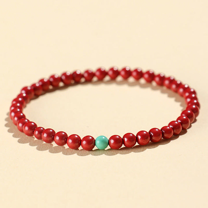 Pulsera de concentración de turquesa cinabrio con Buddha Stones - Cinabrio imperial de 4 mm - image 1