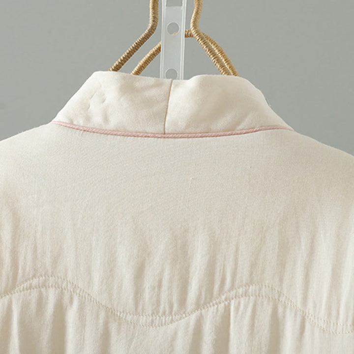 Chaqueta acolchada de algodón de manga larga para mujer con bordado de Buddha Stones y bolsillos - image 4