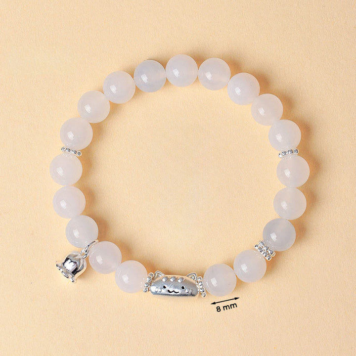 Pulsera con Buddha Stones en plata de ley 999 con cabeza de gato natural y ojo de gato blanco y ágata blanca. - image 12