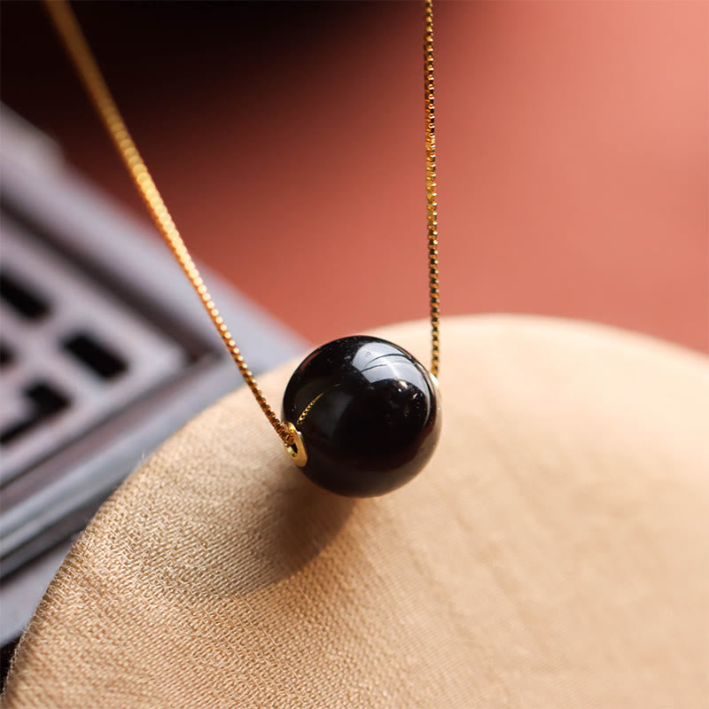 Collar con colgante de cuentas redondas de ámbar y piedras de Buddha Stones en plata de ley 925 que te hará sentir seguro. - Ámbar y plata de ley 925 - image 0