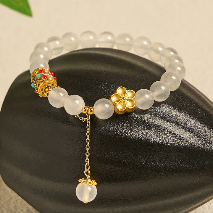 Pulsera de positividad con flores de cristal de ágata blanca tibetana y Buddha Stones - image 1
