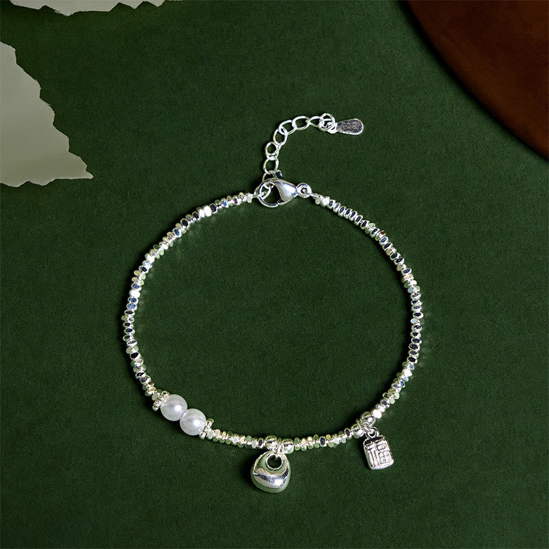 Pulsera de bendición con perla y monedero con símbolo Fu de plata bañada en cobre y Buddha Stones - Monedero de cobre (circunferencia de la muñeca: 15-17 cm) - image 0