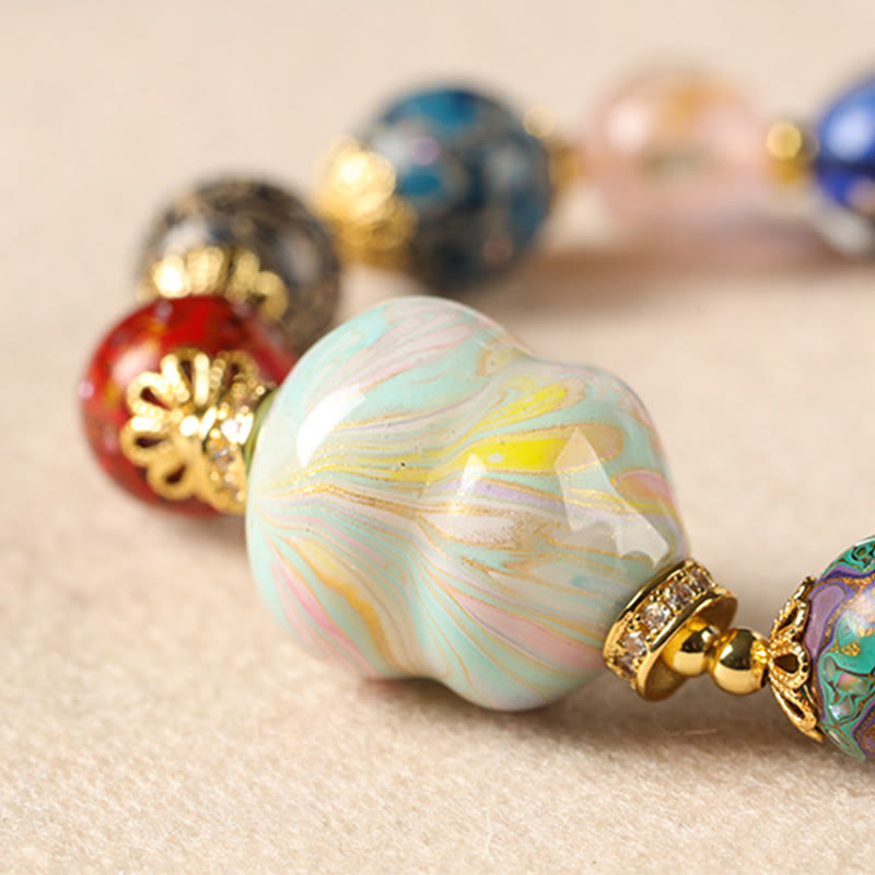 Pulsera artesanal lacada con cuentas de calabaza, sándalo, vidrio y Buddha Stones de colores de Liuli. - image 13