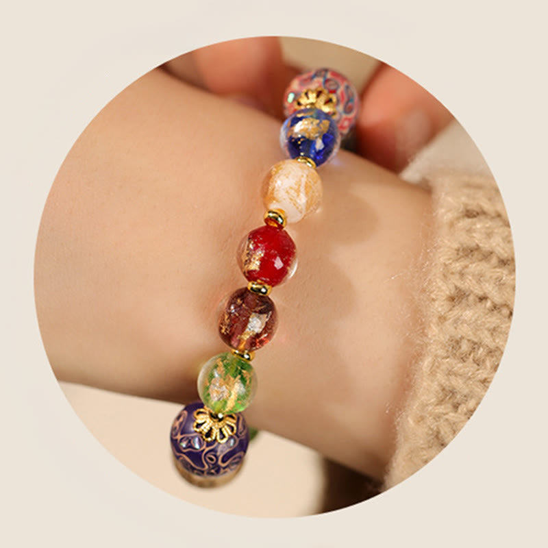 Pulsera artesanal lacada con cuentas de calabaza, sándalo, vidrio y Buddha Stones de colores de Liuli. - image 5