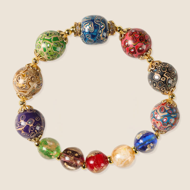 Pulsera artesanal lacada con cuentas de calabaza, sándalo, vidrio y Buddha Stones de colores de Liuli. - image 6