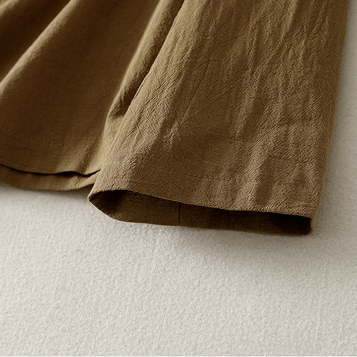 Camisa de algodón de manga larga para mujer con botones asimétricos y estampado de Buddha Stones en la parte delantera. - image 5