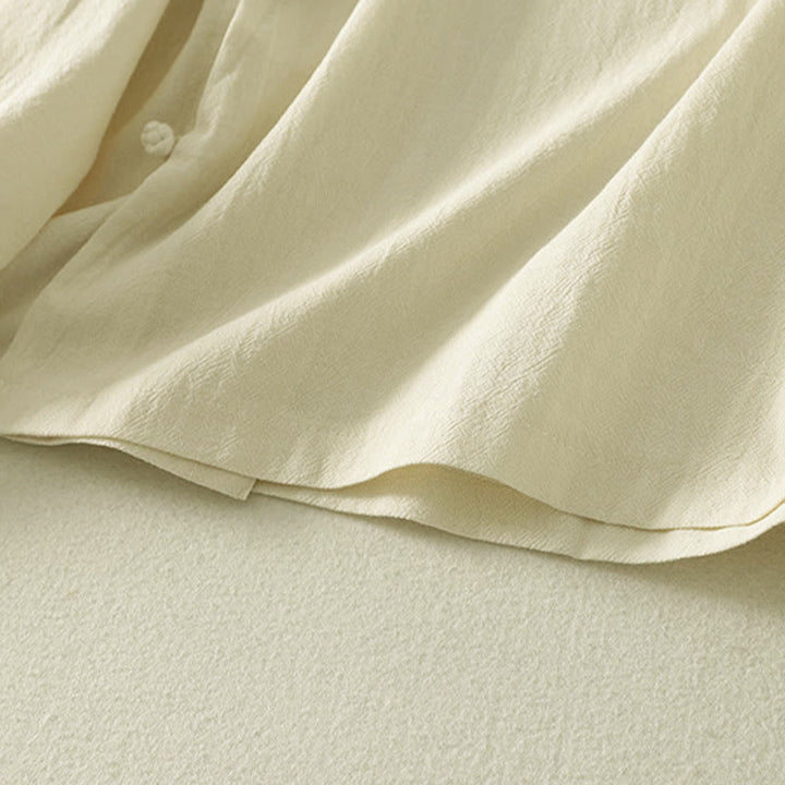 Camisa de algodón de manga larga para mujer con botones asimétricos y estampado de Buddha Stones en la parte delantera. - image 14