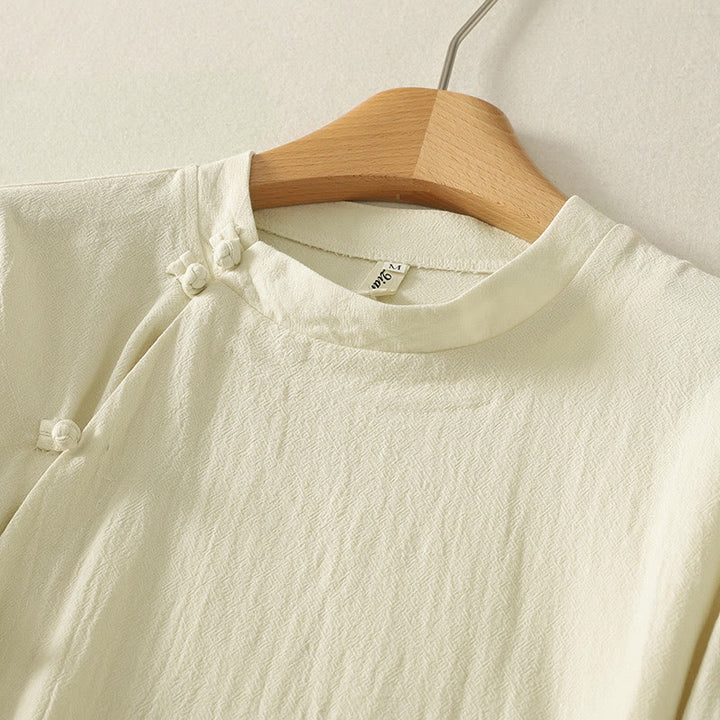 Camisa de algodón de manga larga para mujer con botones asimétricos y estampado de Buddha Stones en la parte delantera. - image 8