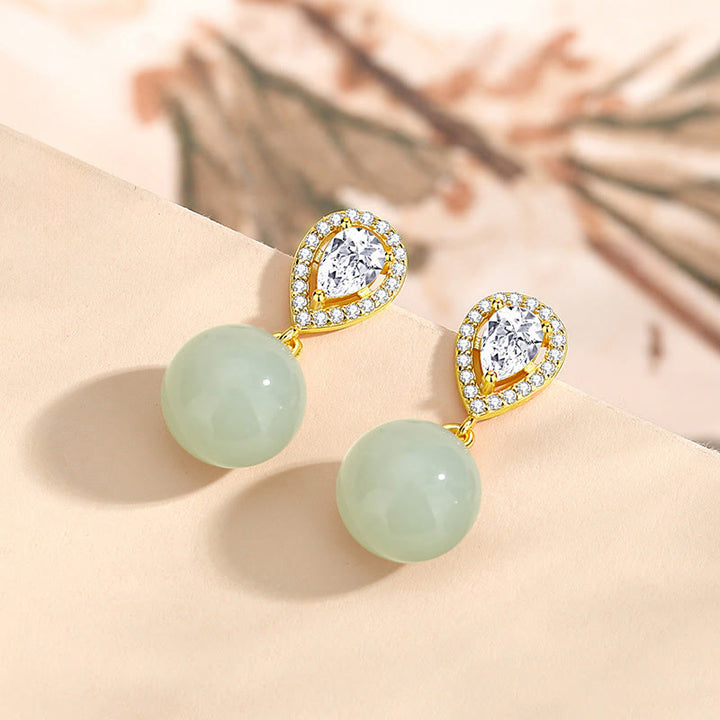 Pendientes de la prosperidad con cuentas de jade Hetian y diseño de gota de agua en plata de ley 925 con Buddha Stones - image 2