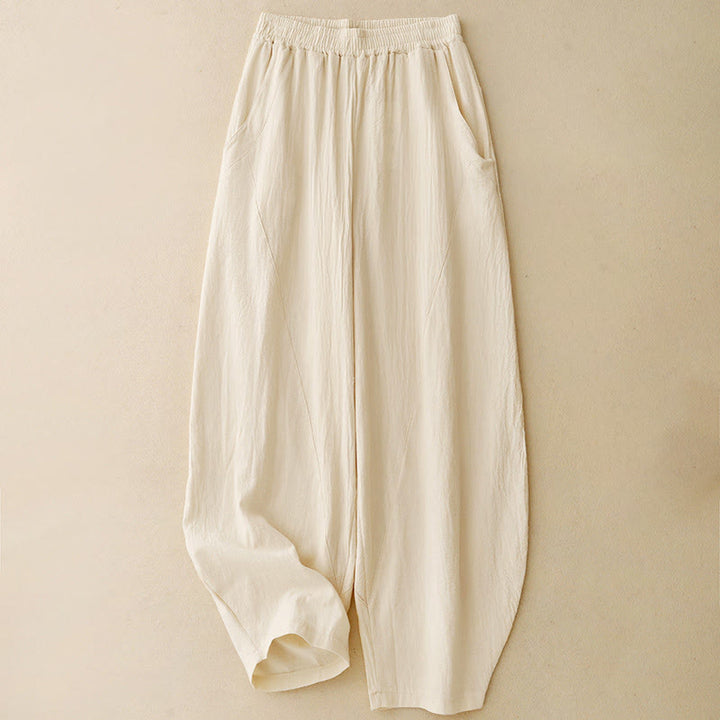 Pantalones de pierna ancha para mujer con bolsillos, estampado patchwork de colores lisos y estampado de Buddha Stones. - image 0