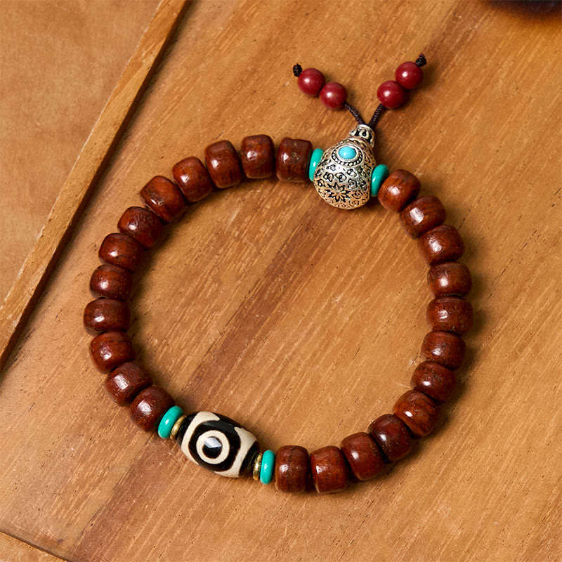 Pulsera de la suerte con cuentas de hueso de Buddha Stones, vajra y cuentas dzi de tres ojos - image 1