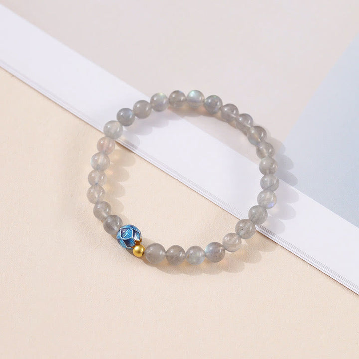 Pulsera con encanto de loto, piedra lunar natural y Buddha Stones - image 1