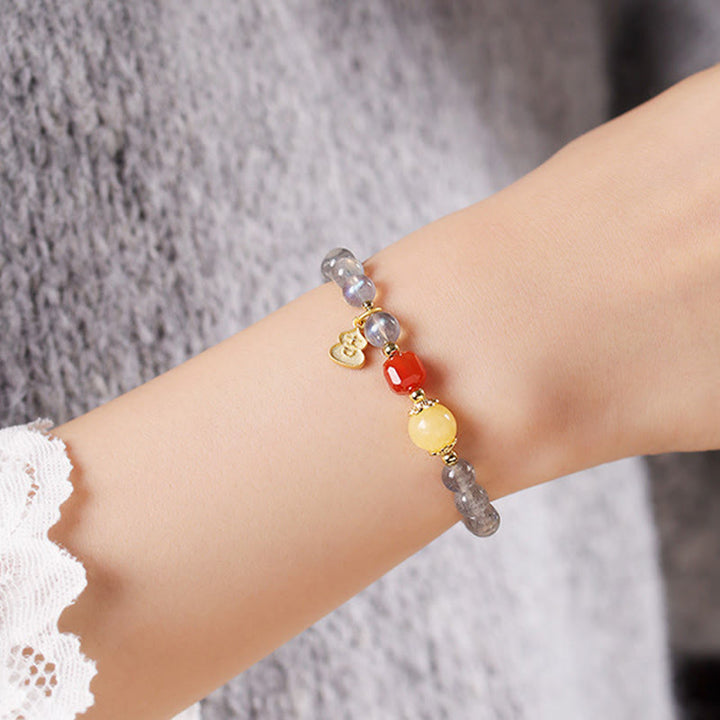 Pulsera con encanto de loto, piedra lunar natural y Buddha Stones - image 13