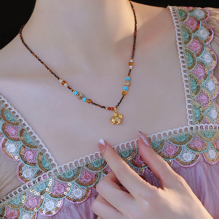 Collar con colgante de protección contra el ojo de tigre con Buddha Stones, año dorado del caballo - image 4