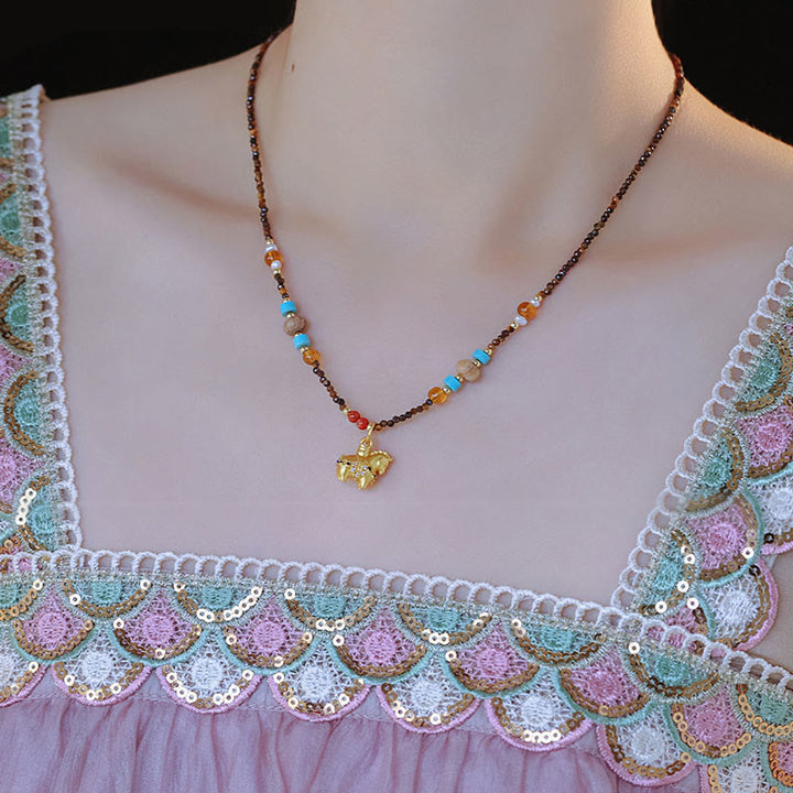 Collar con colgante de protección contra el ojo de tigre con Buddha Stones, año dorado del caballo - image 9