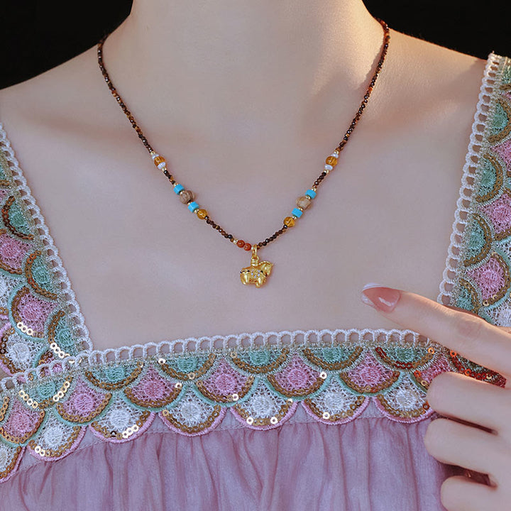 Collar con colgante de protección contra el ojo de tigre con Buddha Stones, año dorado del caballo - image 3