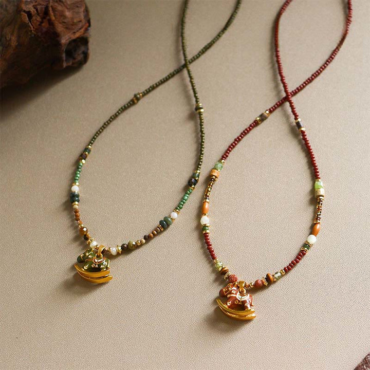 Collar con colgantes de equilibrio, Buddha Stones del año del caballo, ojo de tigre de cobre y varias cuentas. - image 0