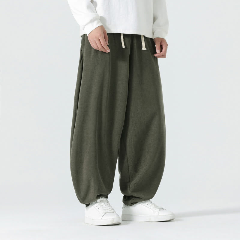 Pantalones tipo harem de pana de color liso con bolsillos y estampado de Buddha Stones. - image 1