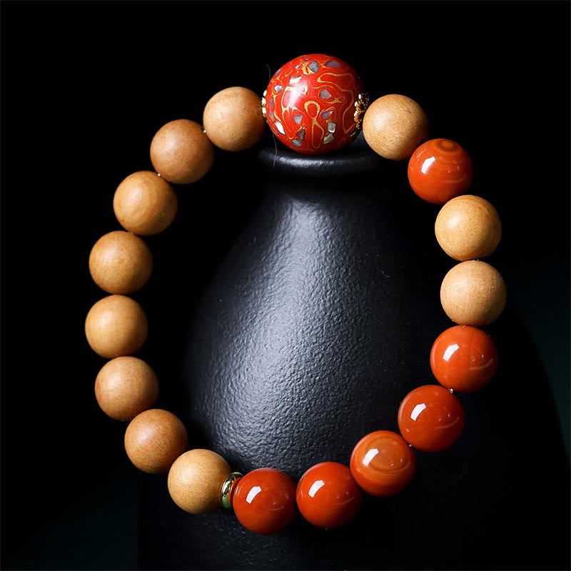 Pulsera protectora de cuentas artesanales lacadas con Buddha Stones, sándalo y ágata roja del sur - image 8