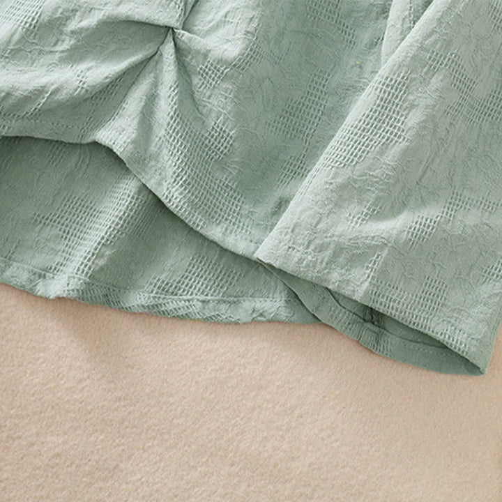 Camisa de manga larga de algodón para mujer con diseño plisado y bajo irregular en jacquard con Buddha Stones - image 38