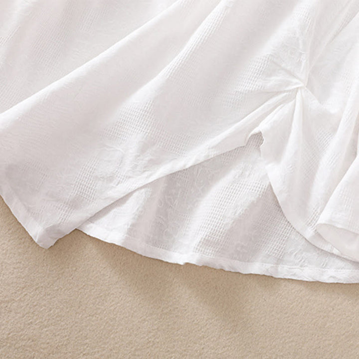 Camisa de manga larga para mujer con diseño plisado y dobladillo irregular en jacquard con Buddha Stones . - image 15