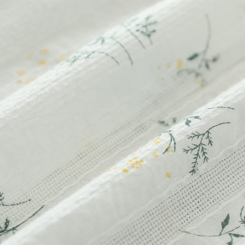 Camisa de manga larga de algodón para mujer con estampado de Buddha Stones, flores blancas y amarillas, hojas verdes y botones. - image 10