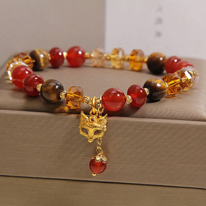 Pulsera de cuentas con dije de zorro, ojo de tigre y Buddha Stones. - image 1