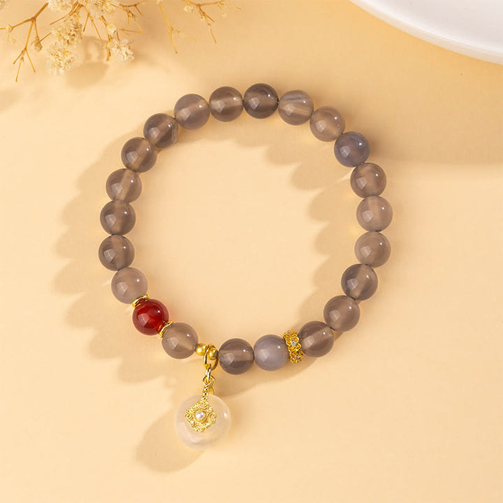 Pulsera de equilibrio con Buddha Stones, ágata gris, ágata roja y calcedonia. - image 2