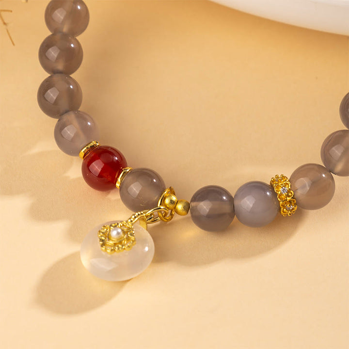 Pulsera de equilibrio con Buddha Stones, ágata gris, ágata roja y calcedonia. - image 3