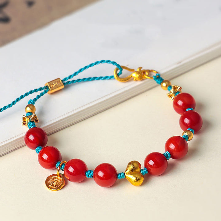 Pulsera de éxito con Buddha Stones de ágata roja del sur de 8 mm y cordón trenzado con forma de corazón - image 0