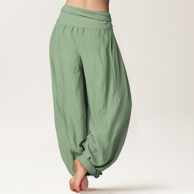 Pantalones harén de algodón verde liso con cintura elástica para mujer de Buddha Stones - image 1