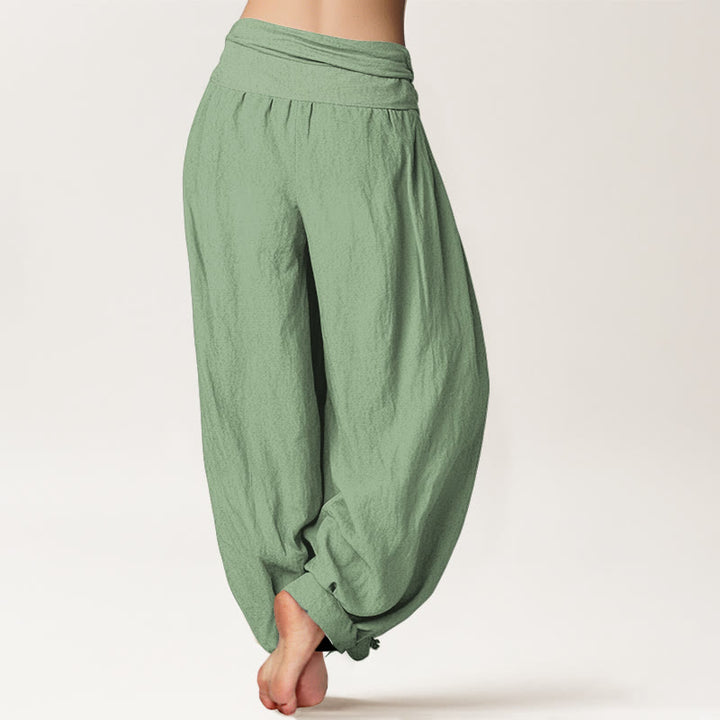 Pantalones harén de algodón verde liso con cintura elástica para mujer de Buddha Stones - image 1