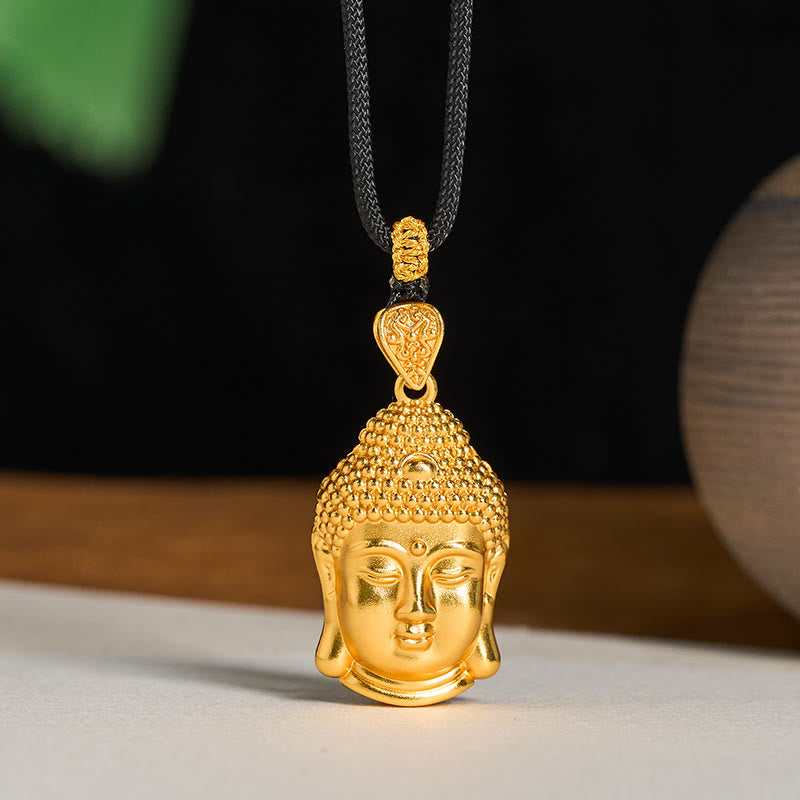 Buddha Stones con colgante de serenidad con símbolo de Buda de latón chapado en oro de 24 quilates y cordón trenzado. - Buda pequeño (tamaño: 18,8 x 32,6 mm) - image 0