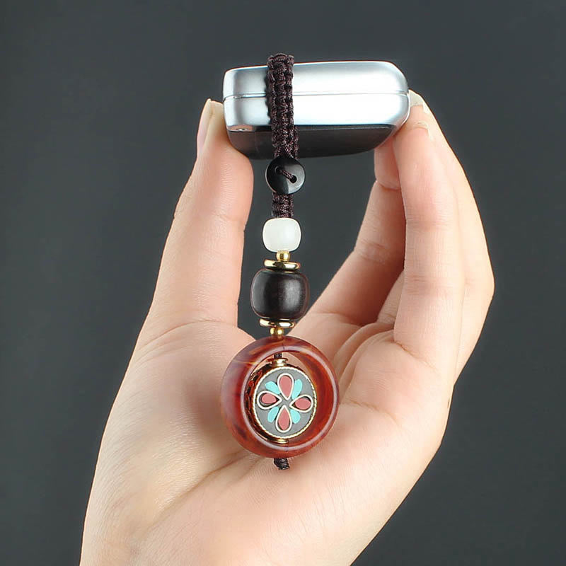 Llavero giratorio con Buddha Stones, madera de ébano, trébol de cuatro hojas en sánscrito, ojo de Buda y paz. - image 11