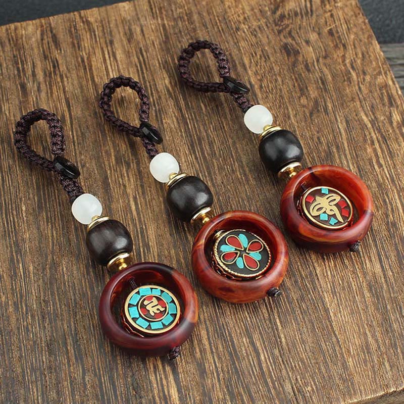 Llavero giratorio con Buddha Stones, madera de ébano, trébol de cuatro hojas en sánscrito, ojo de Buda y paz. - image 12