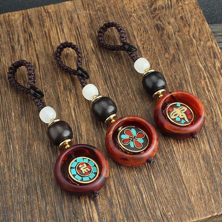 Llavero giratorio con Buddha Stones, madera de ébano, trébol de cuatro hojas en sánscrito, ojo de Buda y paz. - image 12