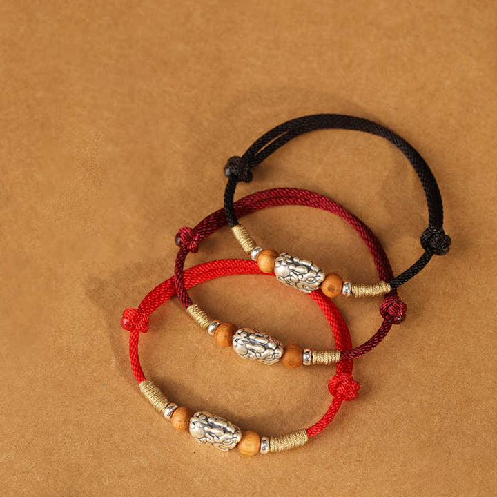 Pulsera tobillera trenzada hecha a mano con cuentas de madera de melocotón y dije de Pixiu de Buddha Stones en plata de ley 999. - image 22